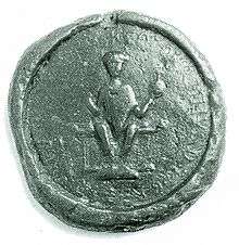 A seal depicting a man on a thrnoe