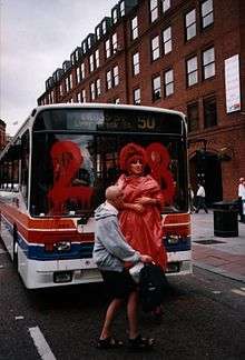 LGBT activists obstruct a bus in Albert Square a year before the transmission of Bob and Rose.
