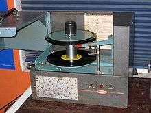 Old metal turntable with thick spindle
