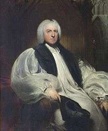 A portrait of a middle-aged white man, enrobed as a bishop and as the chancellor of the Order of the Garter.