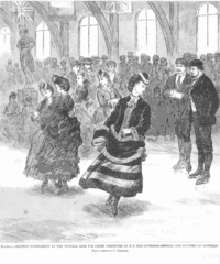 A woman in skates, and a pair of women skaters are skating in front of two men, presumably judges. In the background, off the ice is a large group of spectators.