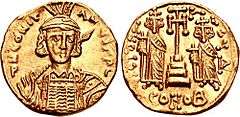 Obverse and reverse of gold coin, with a crowned bearded man carrying a spear over his shoulder on the first, and two standing, robed and crowned men carrying globus crucigers on either side of a cross on a pedestal on the second