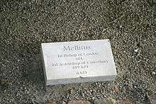 Stone on ground inscribed "Mellitus, first Bishop of London 604, third Archbishop of Canterbury, 619–624, d. 624"