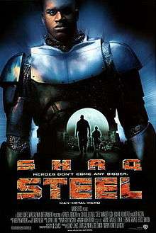 An image of the film poster featuring a small silhouette of the characters Susan Sparks and John Henry Irons in the center. Encompassing the background is a larger image of John Henry Irons in his Steel outfit. The bottom of the image shows the words "Shaq" and "Steel" in large catch phrases "Heroes Don't Come Any Bigger" and "Man Metal Hero" in smaller print. The bottom of the poster showcases the rest of the cast in crew.