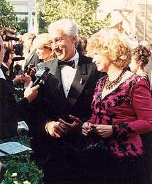 Steven Bochco and wife Barbara Bosson on the red carpet at the Emmys in 1994