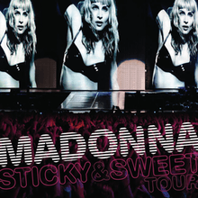 The upper part shows three similar image of a blond woman, wearing a black bra. Her right hand is held up. The lower part shows a crowd looking at her. On top of them, the words "MADONNA" and "STICKY & SWEET TOUR" is written.