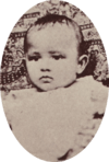 Oval photograph of young baby, 1885.