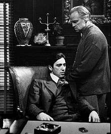 A screenshot of Michael and Vito Corleone during The Godfather