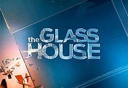 The title of the series, "The Glass House", on a pane of glass.