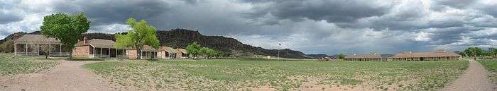 A color photograph of the Fort Davis drill ground in panoramic view