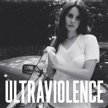 A black and white photo of a fair-skinned, dark-haired woman wearing a sheer white V-neck T-Shirt and a white strapless bra, standing beside a car. Her hand is resting on the opened left car door and the word "Ultraviolence", stylized in all capital letters, is placed on the lower part of the picture.