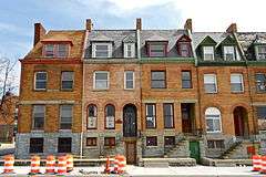 Buildings at 1601-1830 St. Paul Street and 12-20 E. Lafayette Street