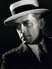 Photo of W. S. Van Dyke wearing a hat