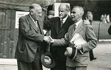 group snapshot of three middle-aged men