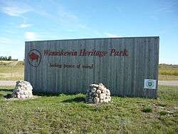 Wooden sign at entrance to Wanuskewin Heritage Park