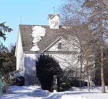 Wood frame building with few windows