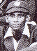 A headshot of a cricketer wearing a cap